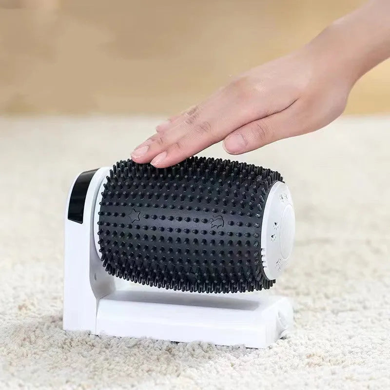 White automatic cat grooming brush mounted on a wall corner, showing USB cable and soft bristles.