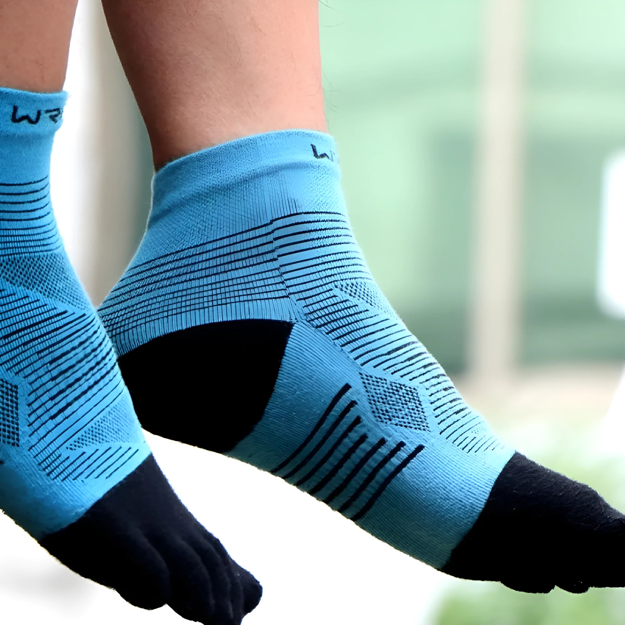 Professional sports toe socks in black and grey colour with separate toes and COOLMAX label.
