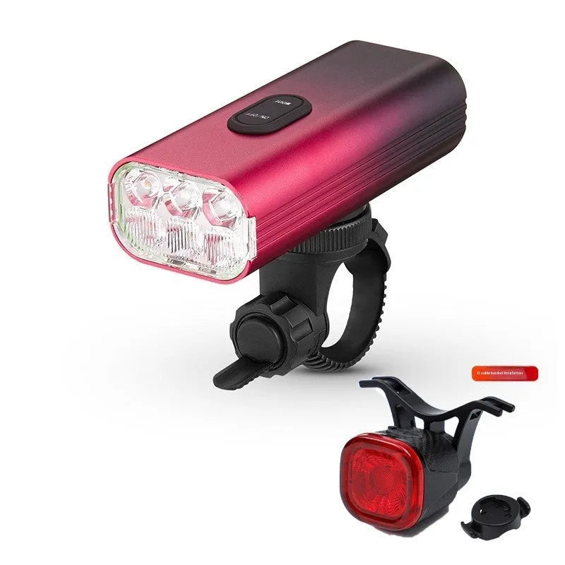 USB rechargeable bicycle headlight and taillight set with plastic mounting bracket on a bike.