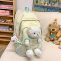 Yellow pink nylon backpack with bear design and curved shoulder straps, 20-35L capacity.