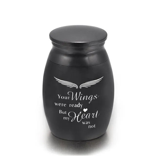 Custom stainless steel pet urn with mirror polish, precision thread seal and colour options in black, gold, photo colour or rose gold.