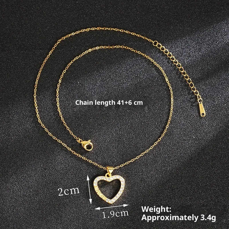 Heart-shaped copper alloy necklace and ear studs set with electroplated finish, O-ring chain, and butterfly design