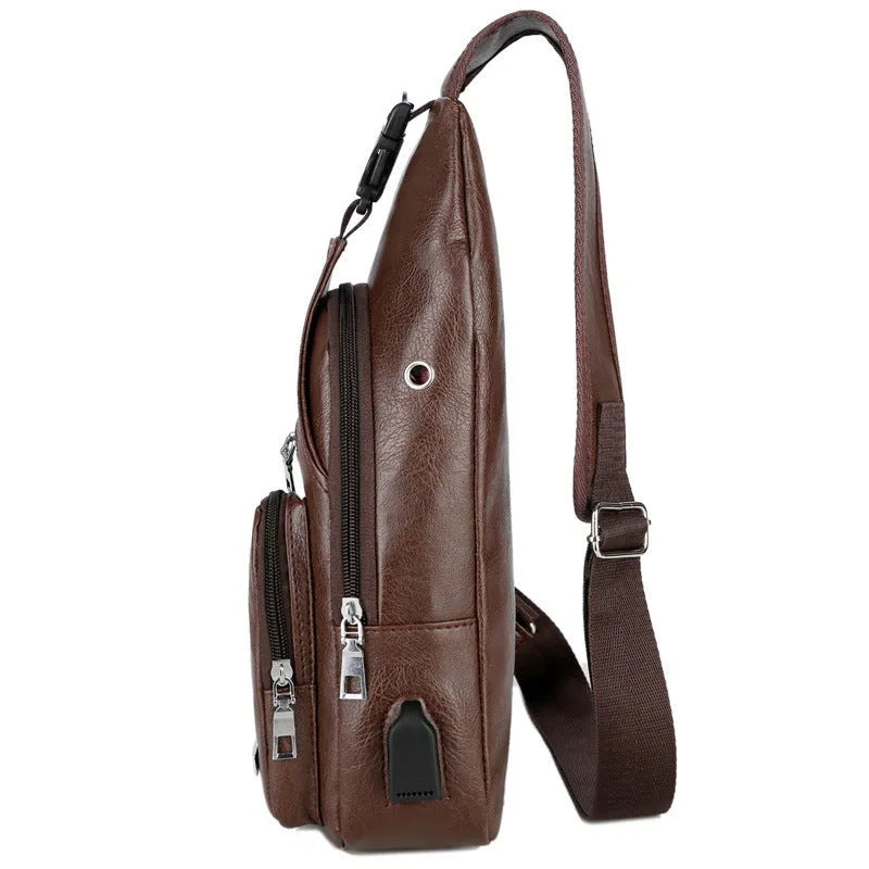 USB portable charging chest bag in PU leather with zipper closure, black colour, front pocket visible
