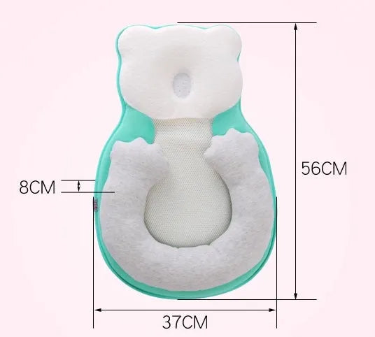 Folded portable baby travel bed with a soft beige cotton sleep cushion for newborns