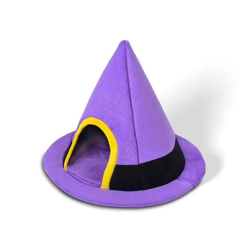Purple cloth witch hat shaped cat bed for Halloween.