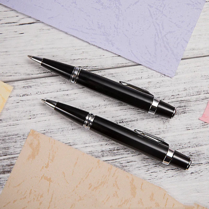 Short black metal ballpoint pen with rotating mechanism showing 112mm length