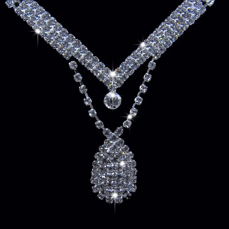 Water drop shape bridal necklace and earrings set with drill detailing for weddings and formal events.