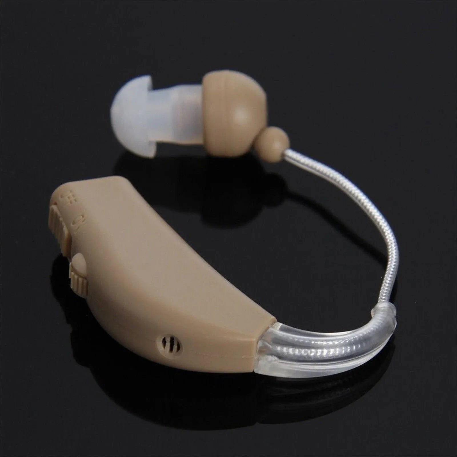 Compact white rechargeable behind-the-ear digital hearing amplifier device with plastic housing.