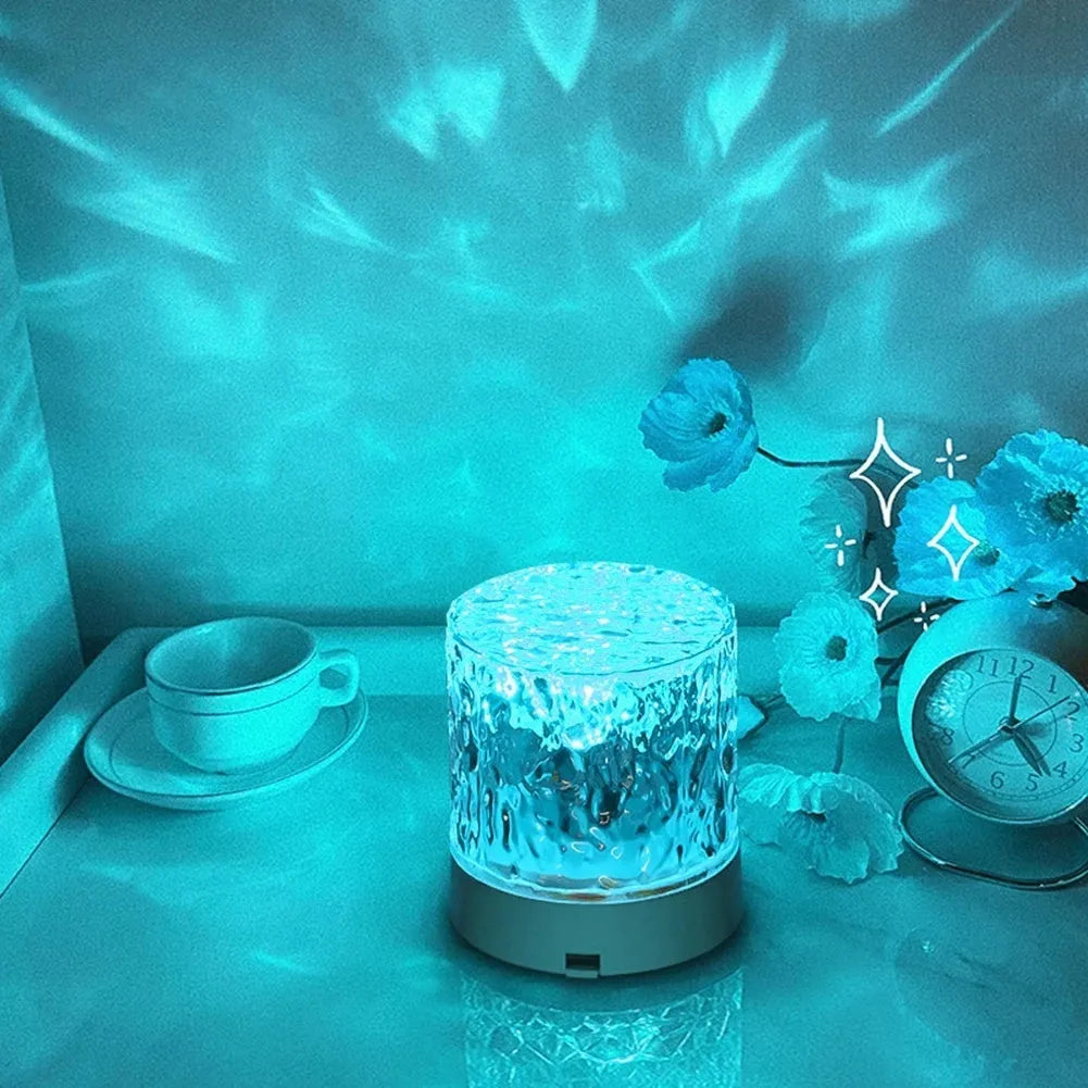 Crystal water ripple projector night light with acrylic lampshade, USB charging and touch control on a table