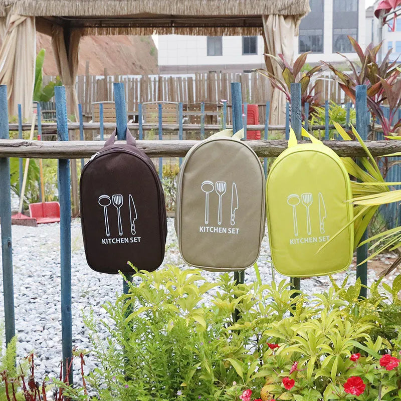 Portable picnic kitchenware storage bag containing 12 stainless steel utensils.