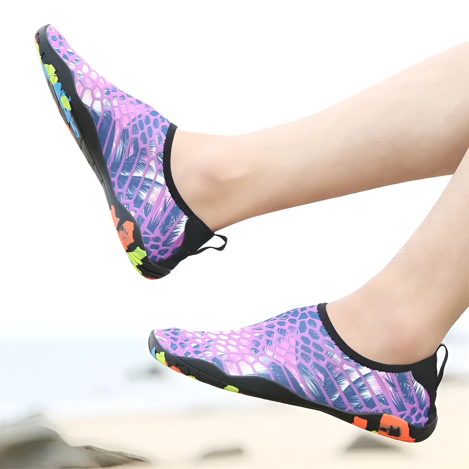 Blue Lycra beach wading shoes with EVA midsoles on a sandy background.
