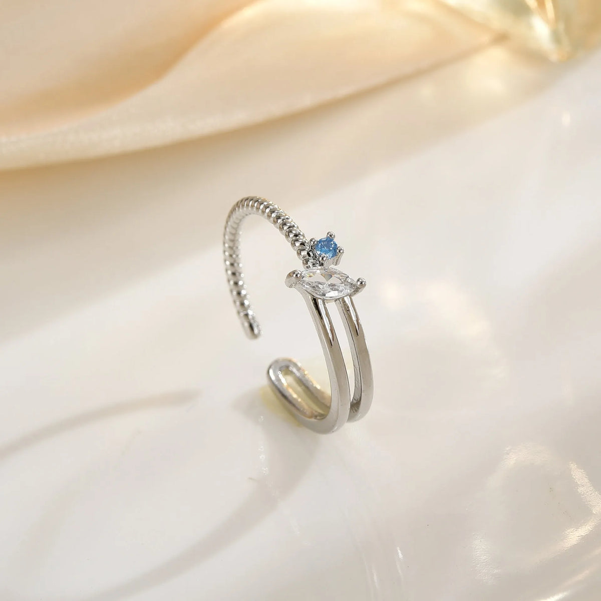 Adjustable irregular geometric ring in gold or silver electroplated copper with line detailing