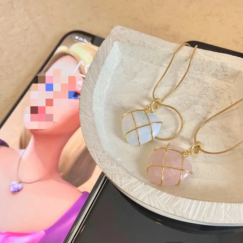 Heart-shaped moonstone pendant necklace on copper chain with electroplated real gold finish