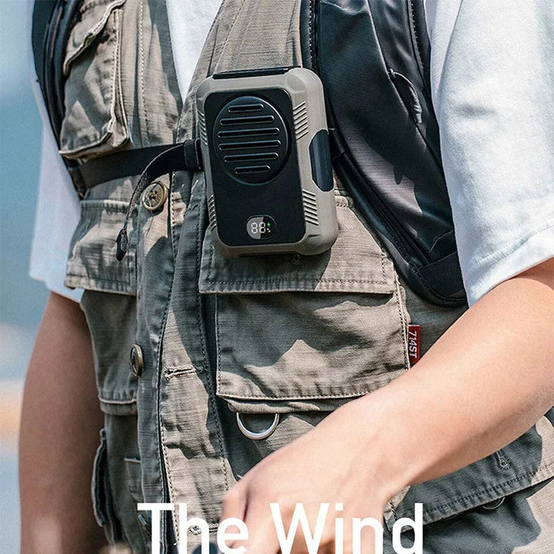 Green waist hanging fan with neck strap showing USB charging port and leafless blade design