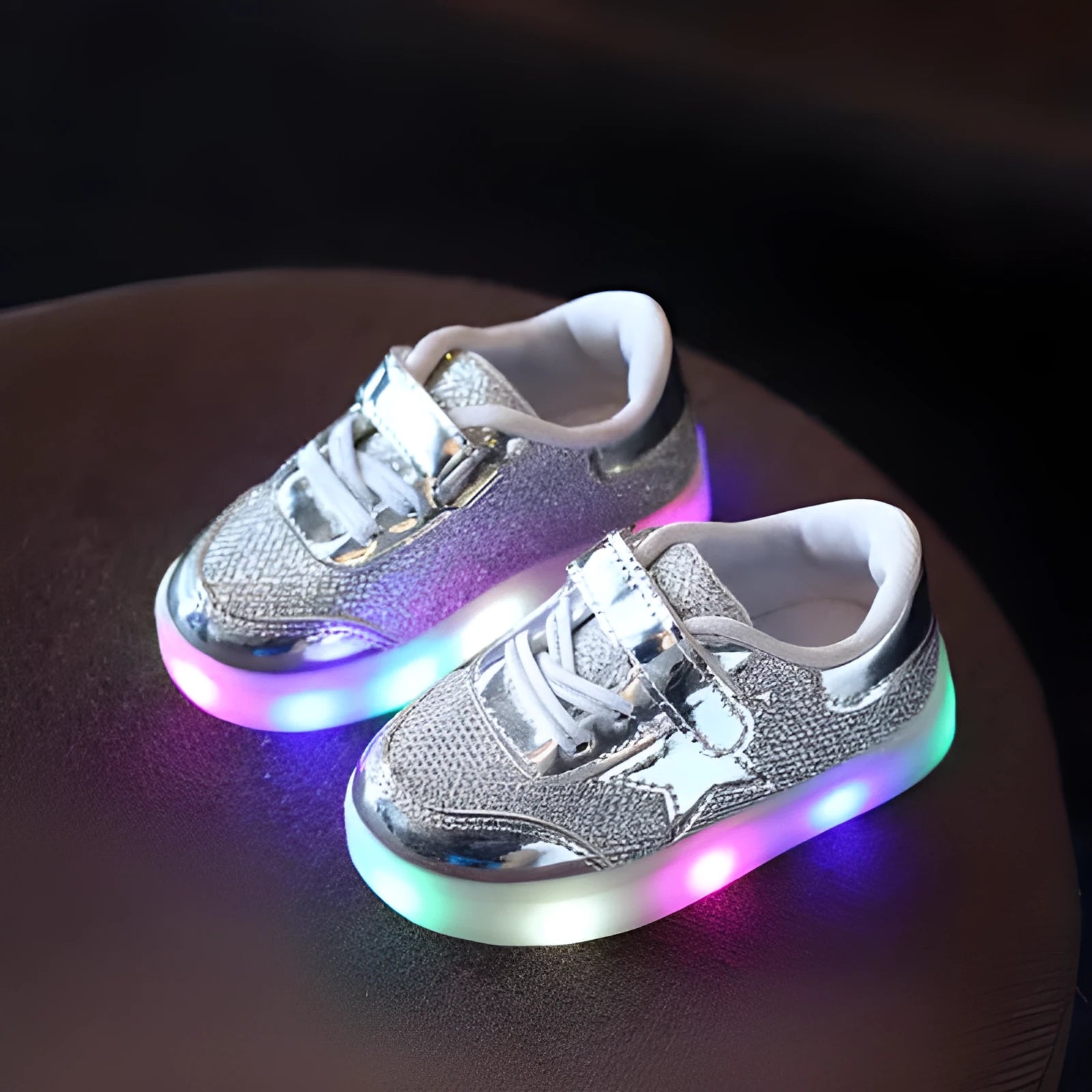Children's LED light up shoes with button activation in golden, pink, or silvery colours