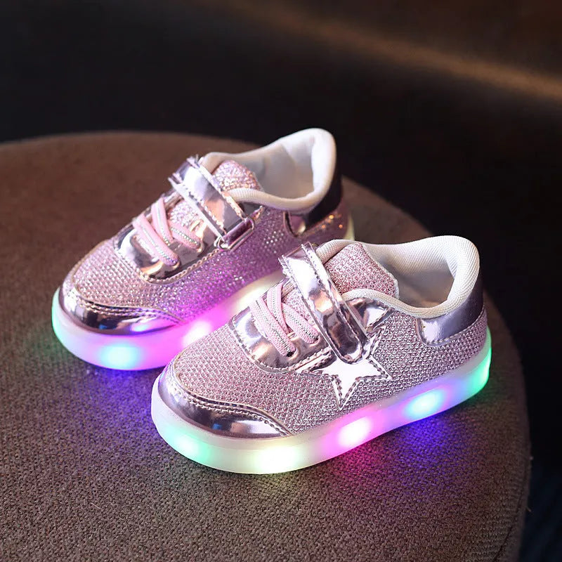 Children's LED light up shoes with button activation in golden, pink, or silvery colours