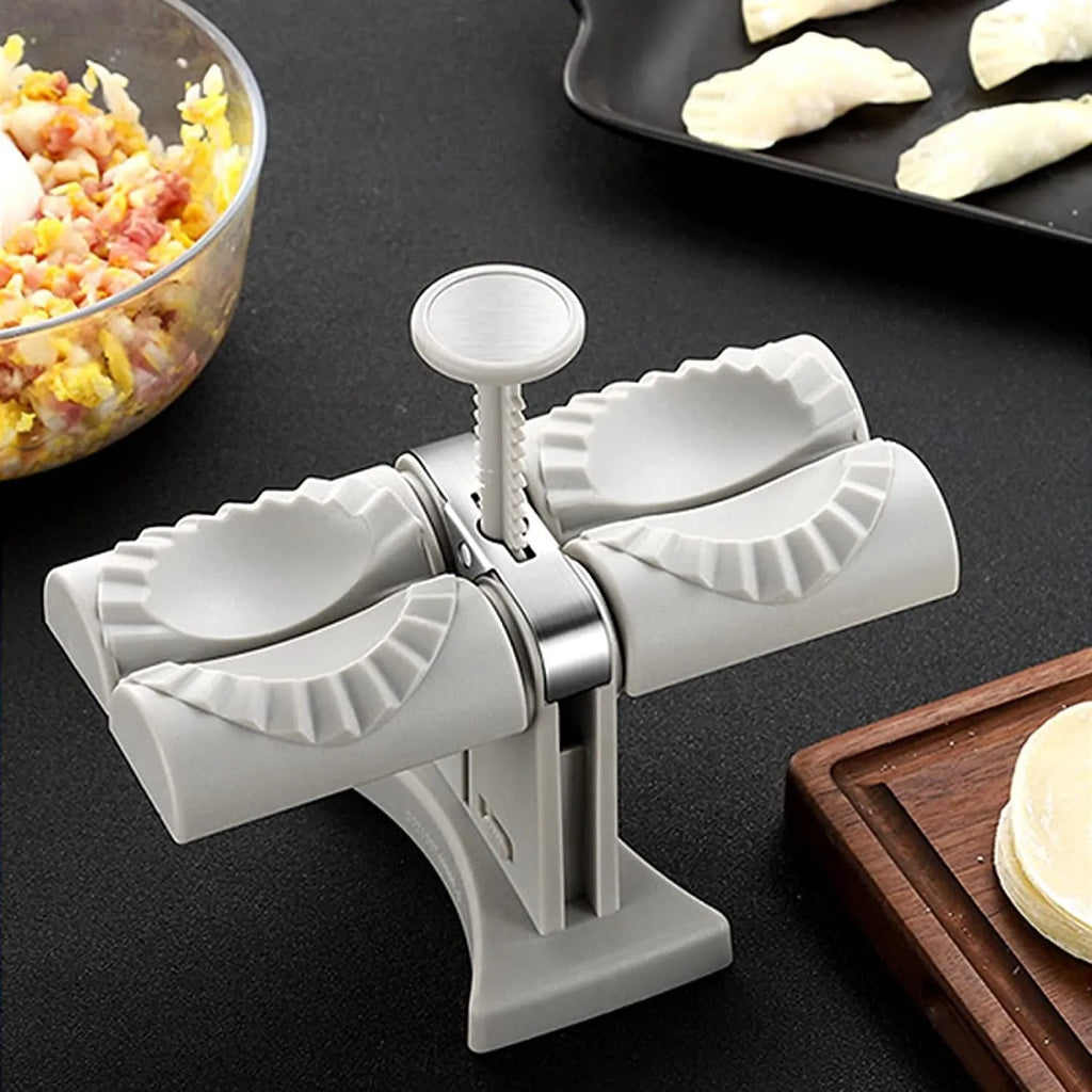 White double-head manual dumpling press with stainless steel mould and plastic handles