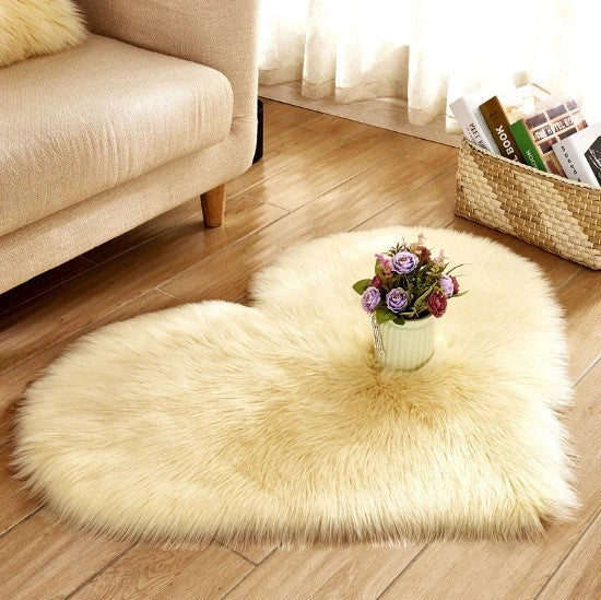 Soft and plush heart-shaped rug in various colors, perfect for cozy home decor