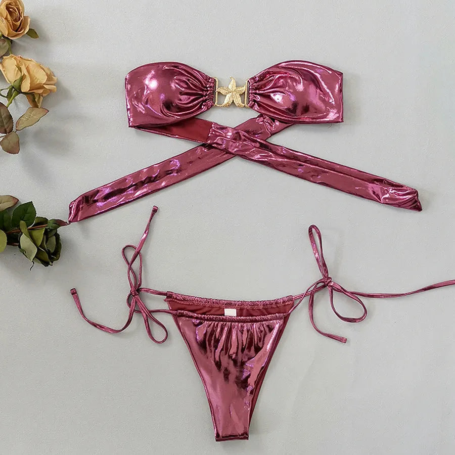 Blue glossy women's bikini with gold starfish print and tube top design