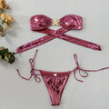 Blue glossy women's bikini with gold starfish print and tube top design