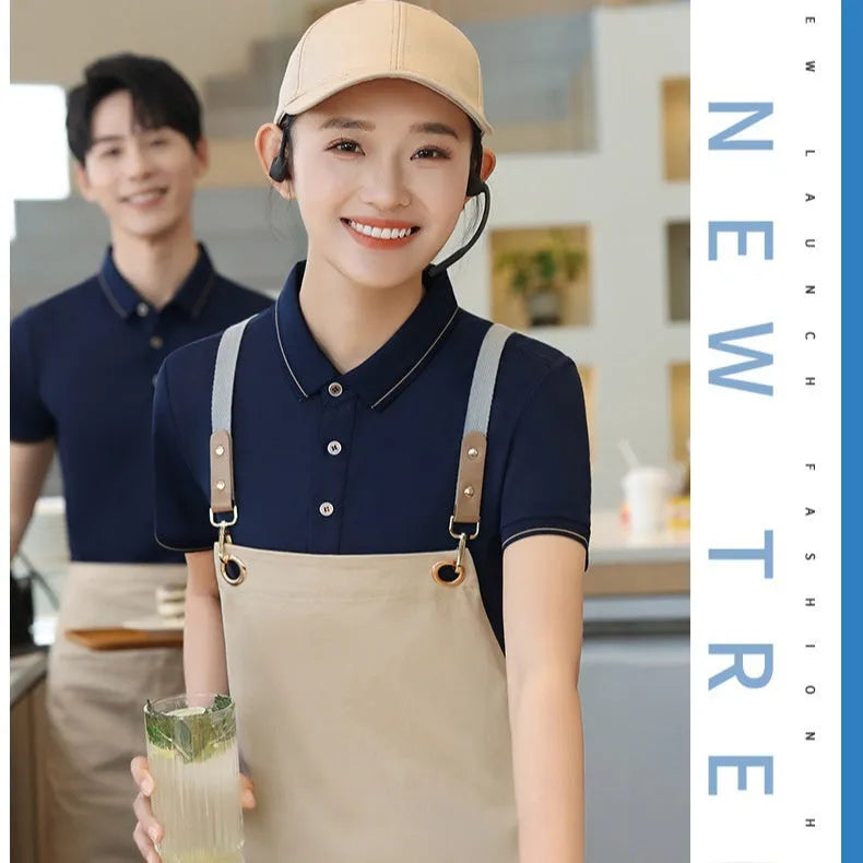 Short sleeve waiter work shirt in black polyester-acetate fabric with regular sleeves, front view on model.