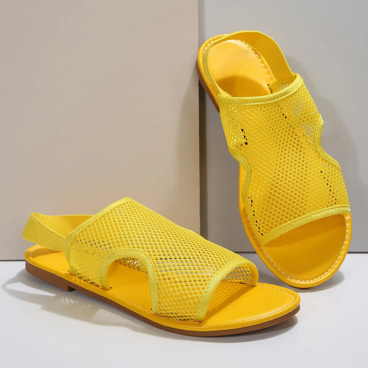 Stylish and breathable mesh sandals in various vibrant colors for men and women