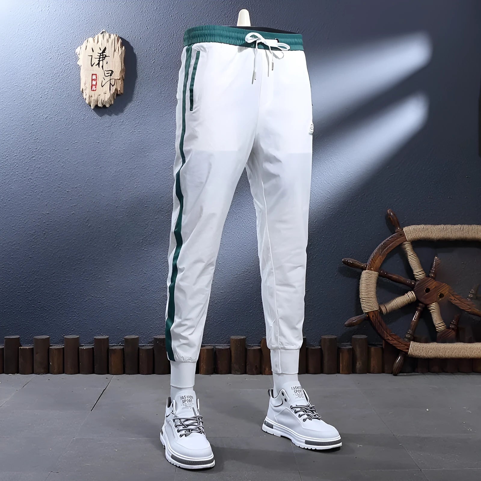 Ice silk breathable stretch ankle-tied skinny sports trousers for men in black striped pattern