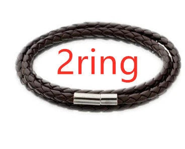 Personalized leather bracelet with engraved name charm for men, featuring a braided design and stainless steel beads