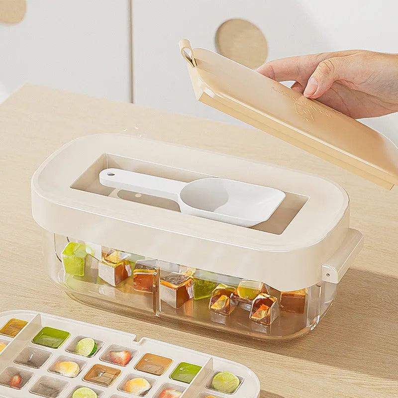 High capacity plastic ice cube tray grid in blue with an ice shovel stored in a dedicated slot.