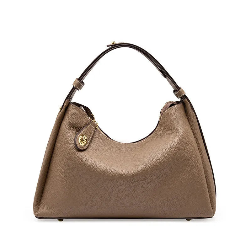Genuine leather cross body shoulder bag in retro style with zipper closure and internal pockets