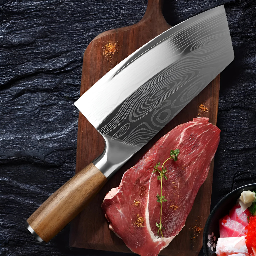 Stainless steel kitchen knife with a 320mm long blade on a kitchen counter.