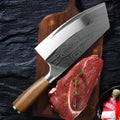 Stainless steel kitchen knife with a 320mm long blade on a kitchen counter.