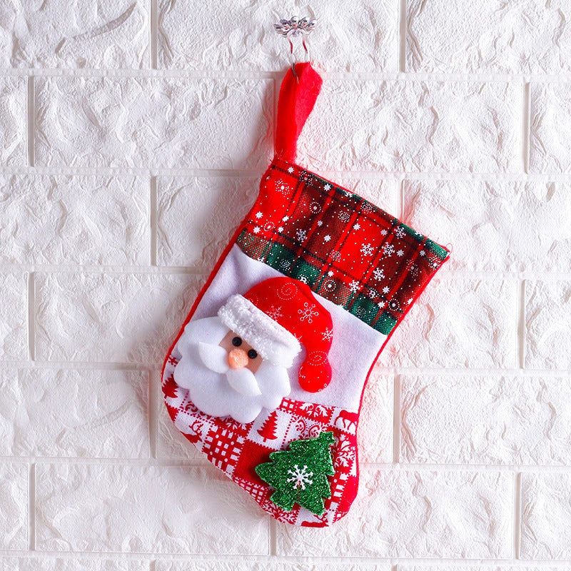 Colorful Christmas ornament-themed socks in a variety of designs, including an elk, bear, elderly person, and snowman.