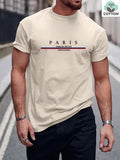 A loose-fit men's short-sleeve T-shirt with a printed letter design, shown in apricot colour.