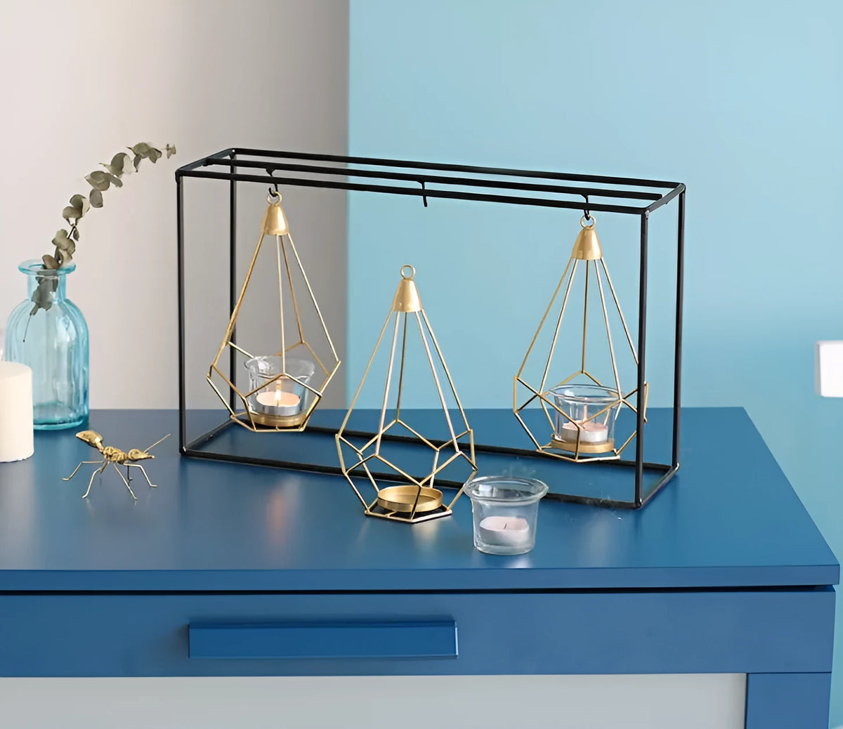Iron candle holders for block candles in six Nordic styles: single, double, triple, triangle, rectangular.