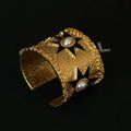 Gold-plated wide retro bracelet with star detailing, 5.8cm interface, picture colour finish
