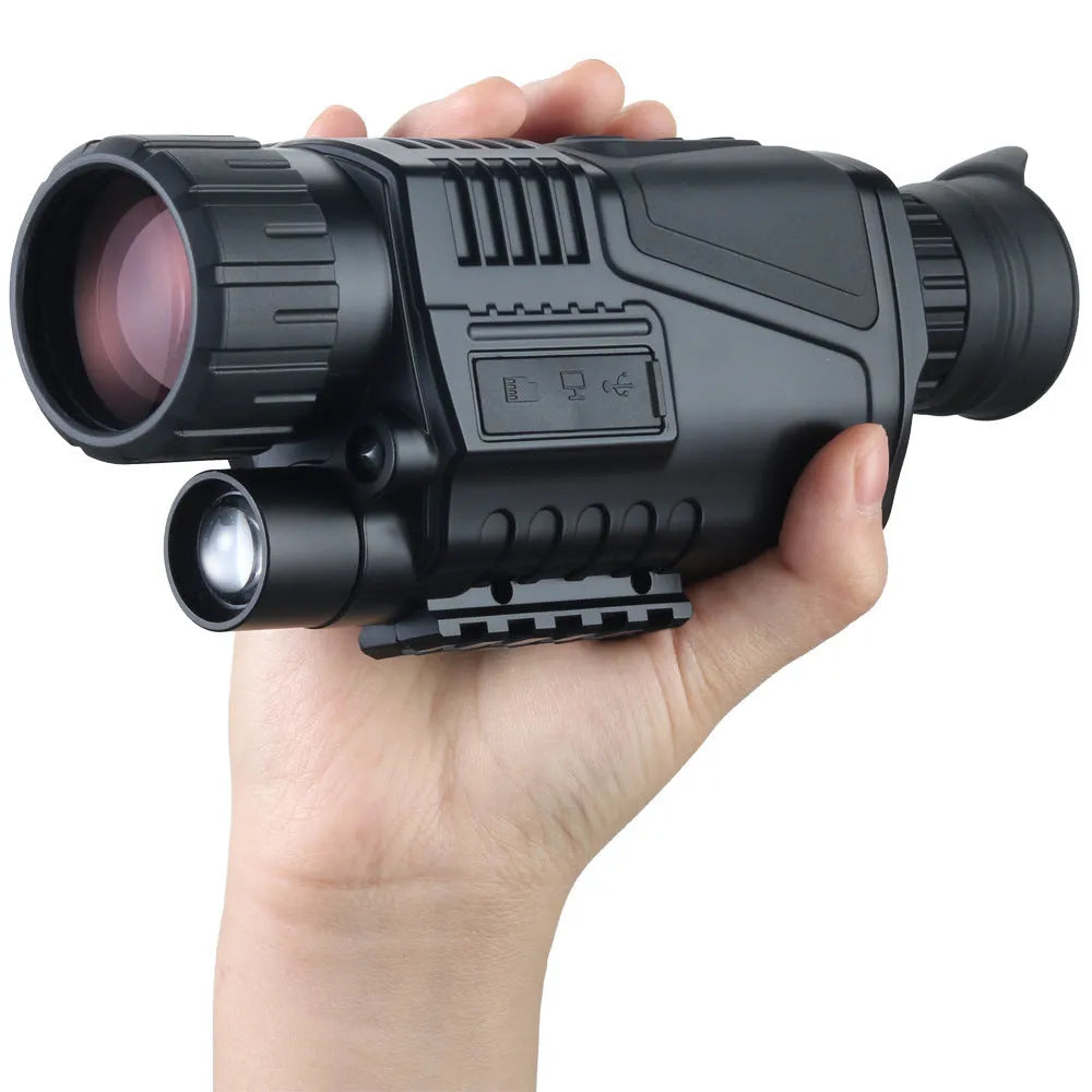 Black infrared digital night vision telescope with 40mm lens on a table with storage bag and cables.