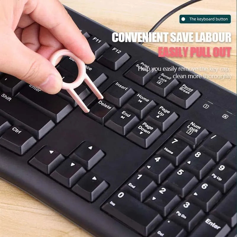 Multifunction electronics cleaning kit with foldable pen, spray bottle, brush, and keycap puller on a white background.
