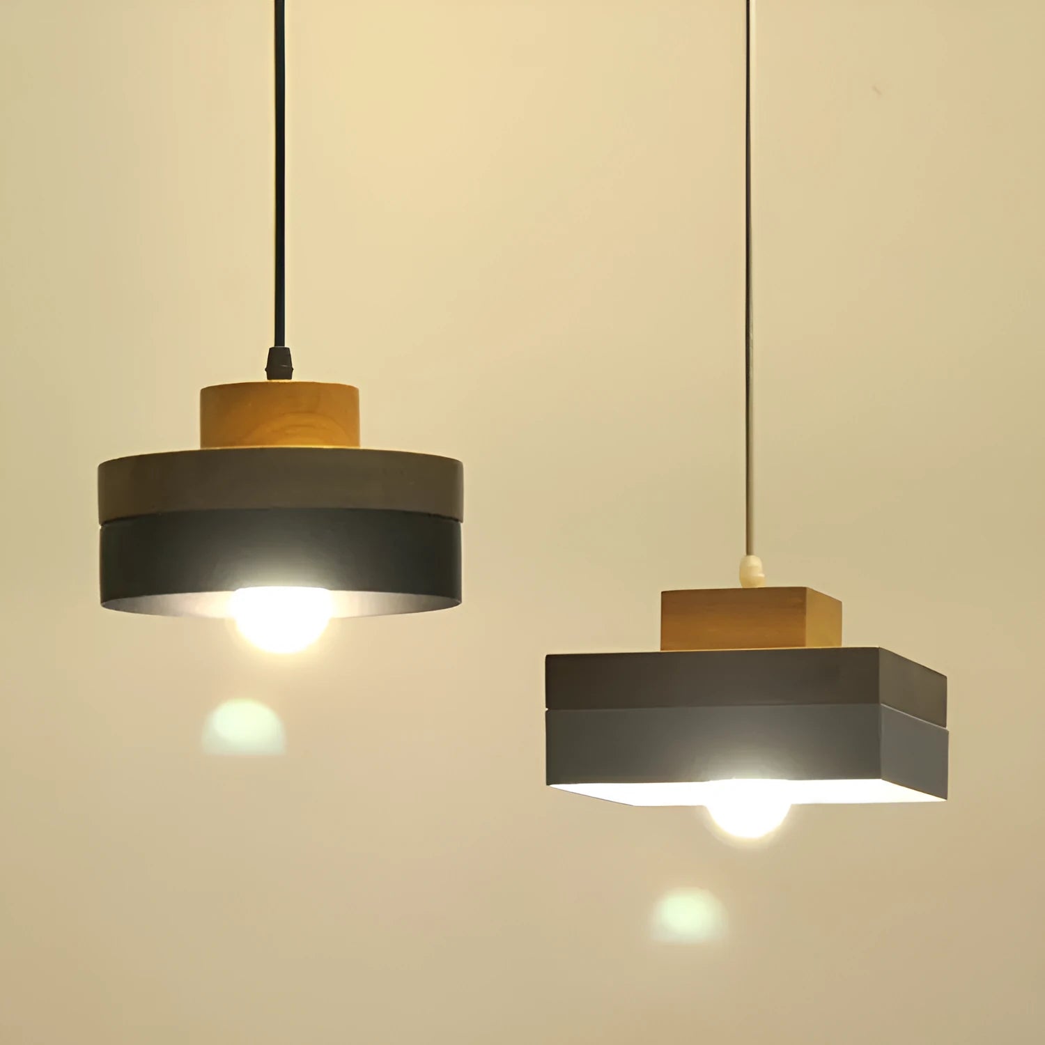 Wooden round and square LED chandeliers in matte black and white finishes with adjustable suspension
