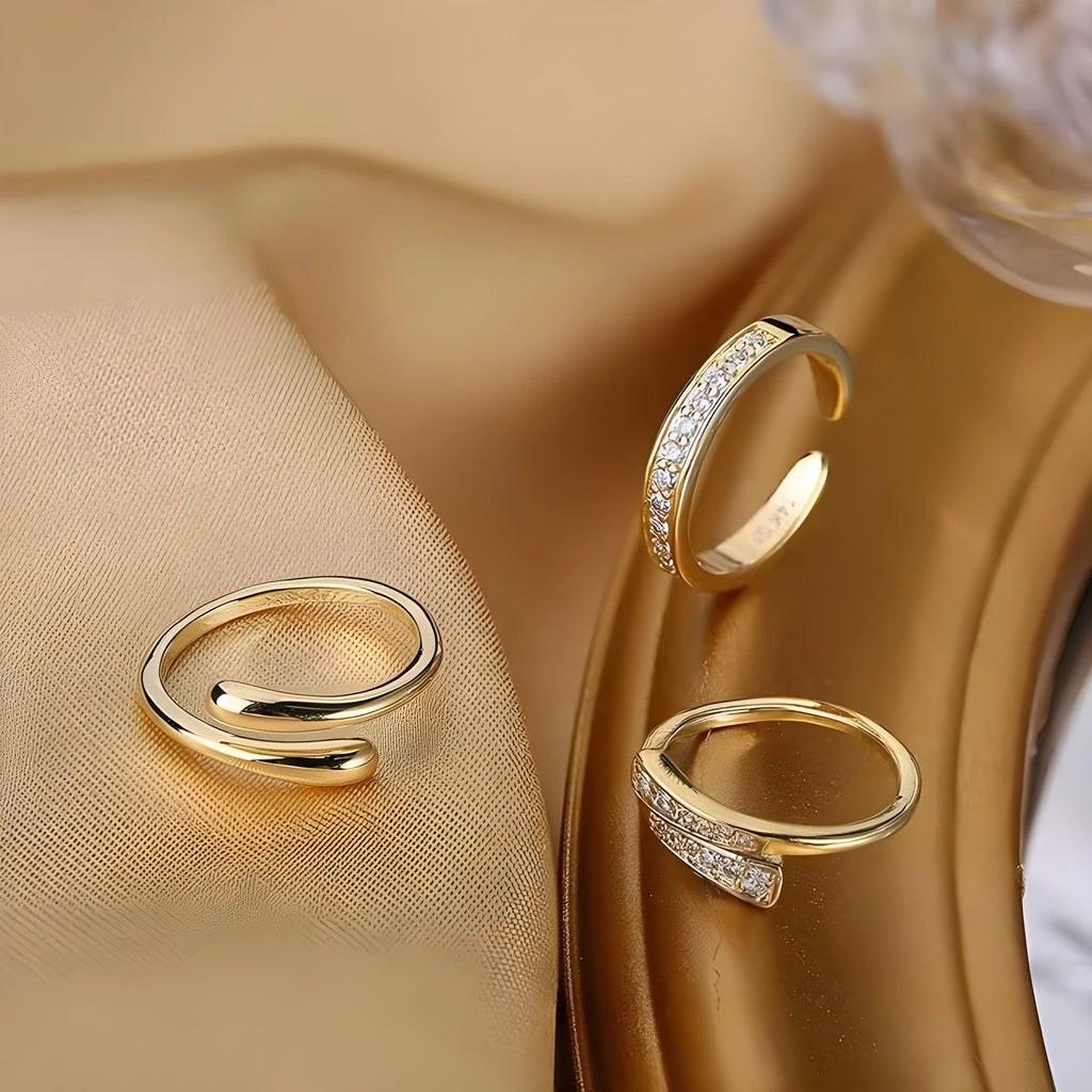 Geometric gold plated toe ring with rhinestone or water drop design options.