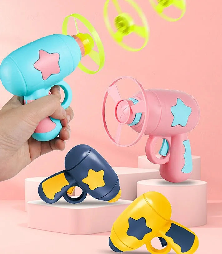Flying saucer launcher toy set with gun and coloured discs for outdoor children's play
