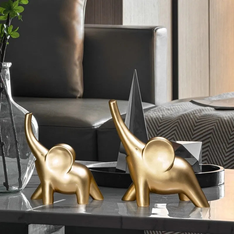 Modern simple style resin elephant ornament in rose gold or white, available in large and small sizes.