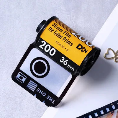 Memory film album with wooden boxes in yellow, pink and blue colours including tote bag