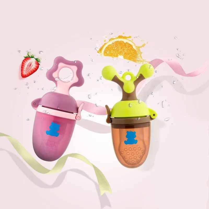 Green and purple silicone baby teether with textured chewing surfaces and a central handle.