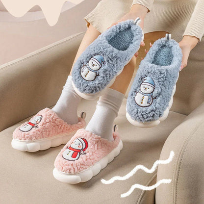 Cozy snowman-designed slippers with plush upper and anti-slip sole for indoor winter wear