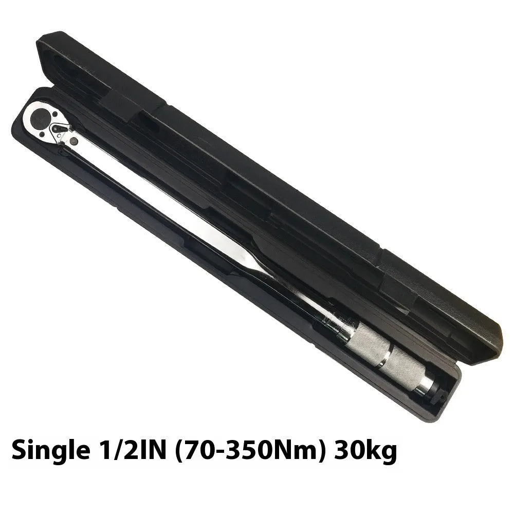 Five-piece multifunctional torque preset torque wrench set with extension rods on a workbench