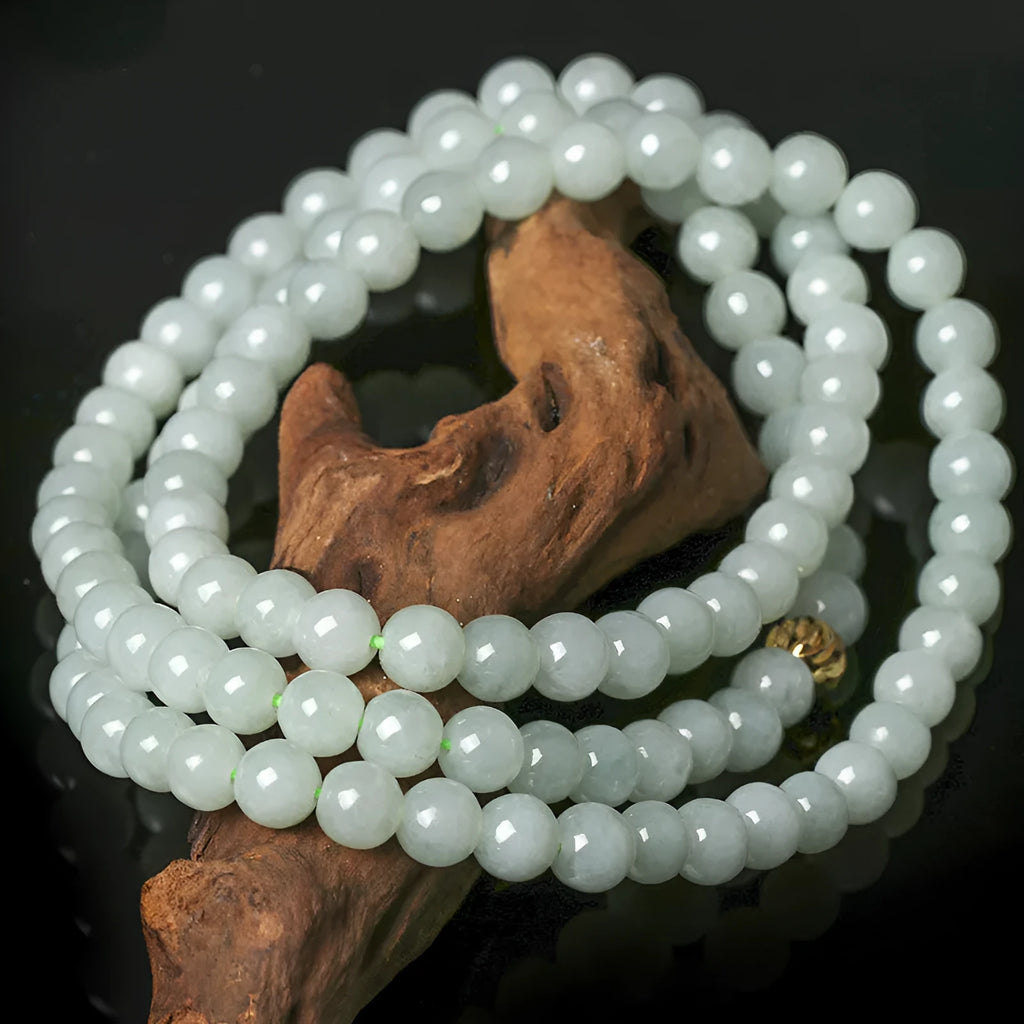 Adjustable jade bead necklace with 6.5mm round beads showing white and green colour variations