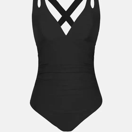 Solid colour one-piece swimsuit with a triangle bikini top and cross shoulder straps.