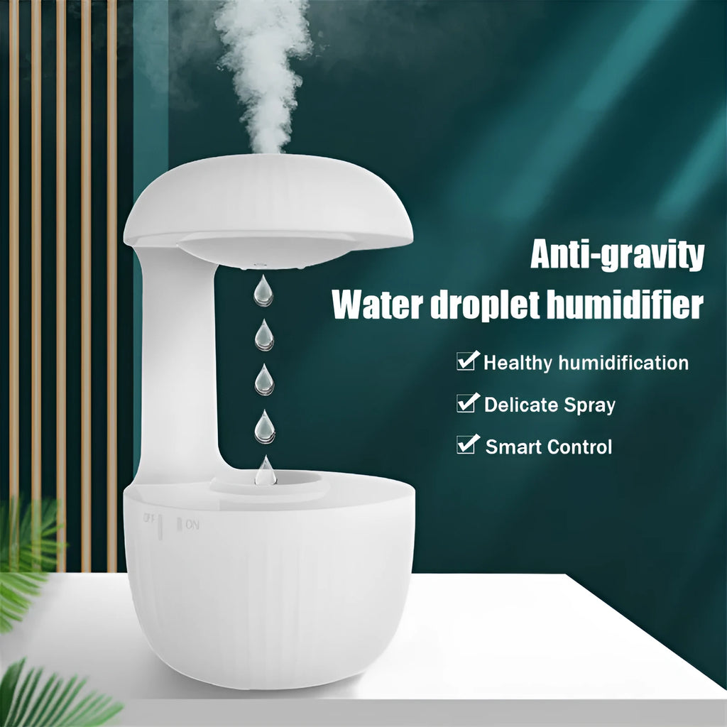 White anti-gravity levitating humidifier showing water droplets flowing upward with cool mist output