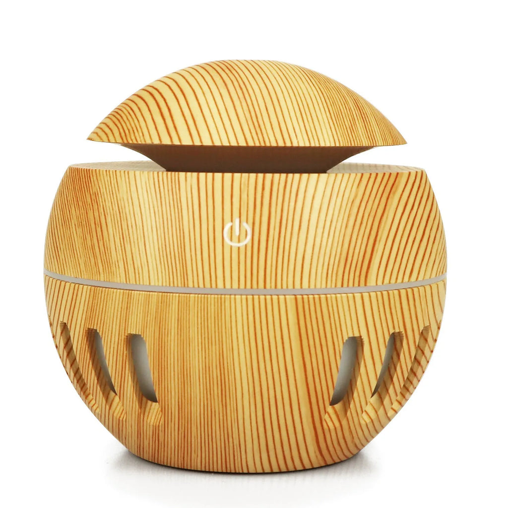 Planet portable USB humidifier in dark wood finish with single fog outlet